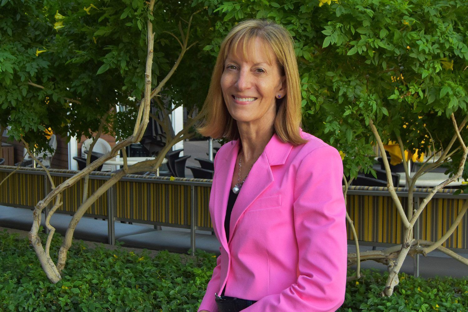 PCA Board Chair Diane Haller poses outside the Downtown Phoenix, Inc./Phoenix Community Alliance offices. (Photo by Taylor Costello)