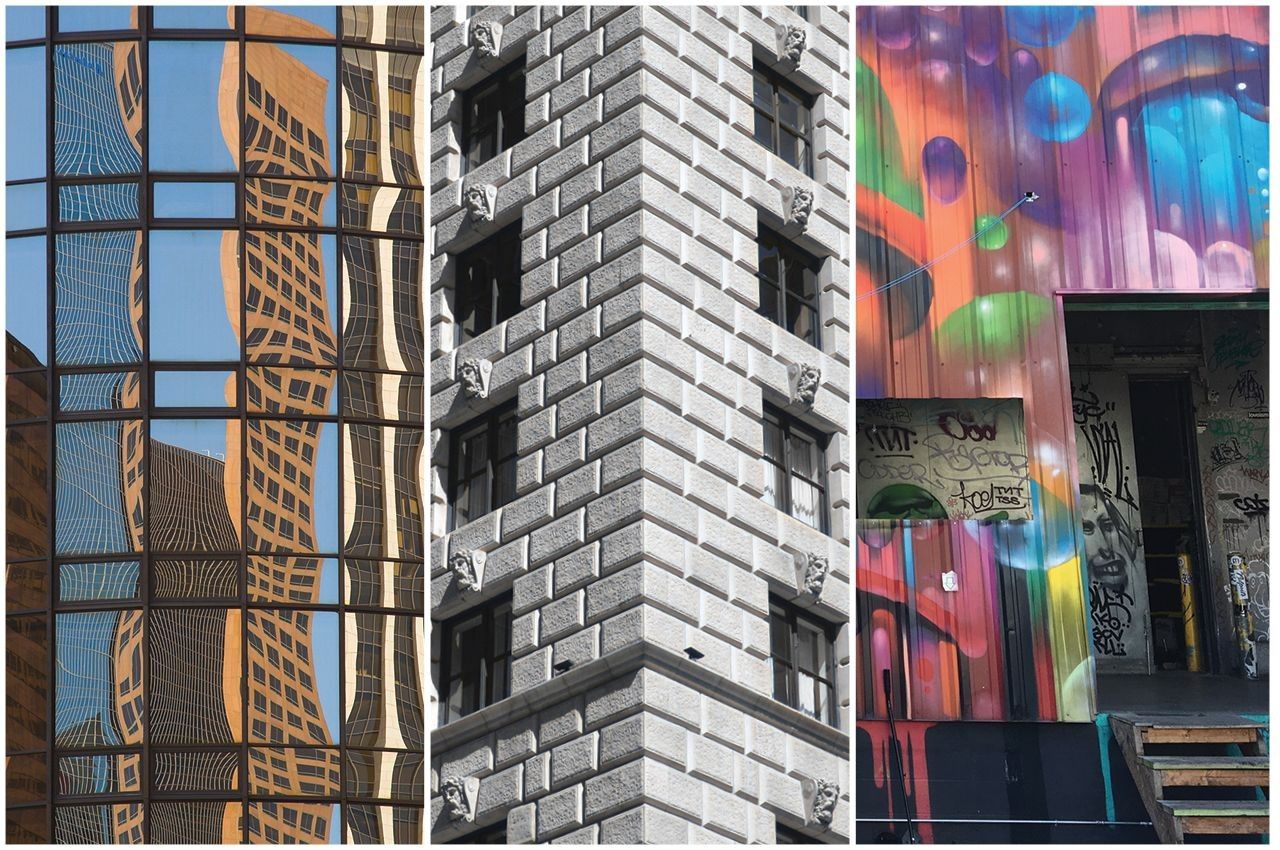 three office building facades, one mirrored, one stone, one colorfully painted