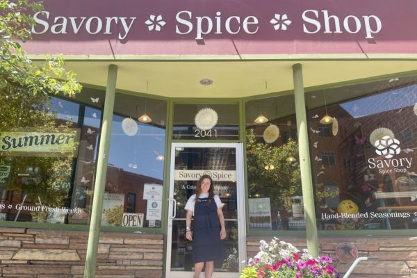 photo of Avery (Store Manager) outside of Savory Spice Shop