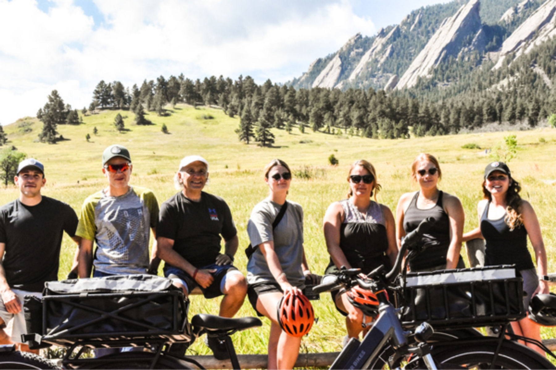 ride colorado team in front of flatirons