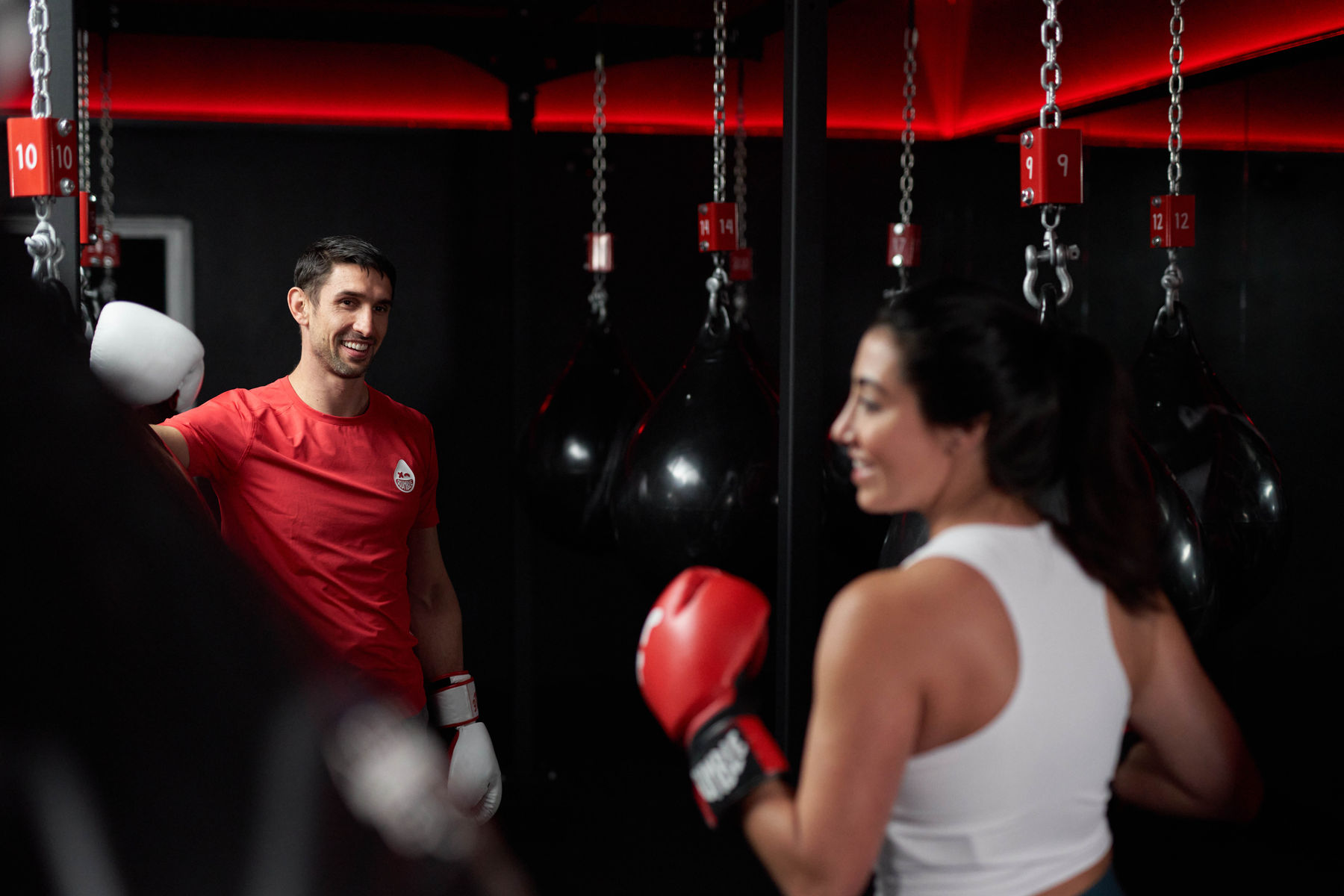 Couple working out at Rumble Boxing