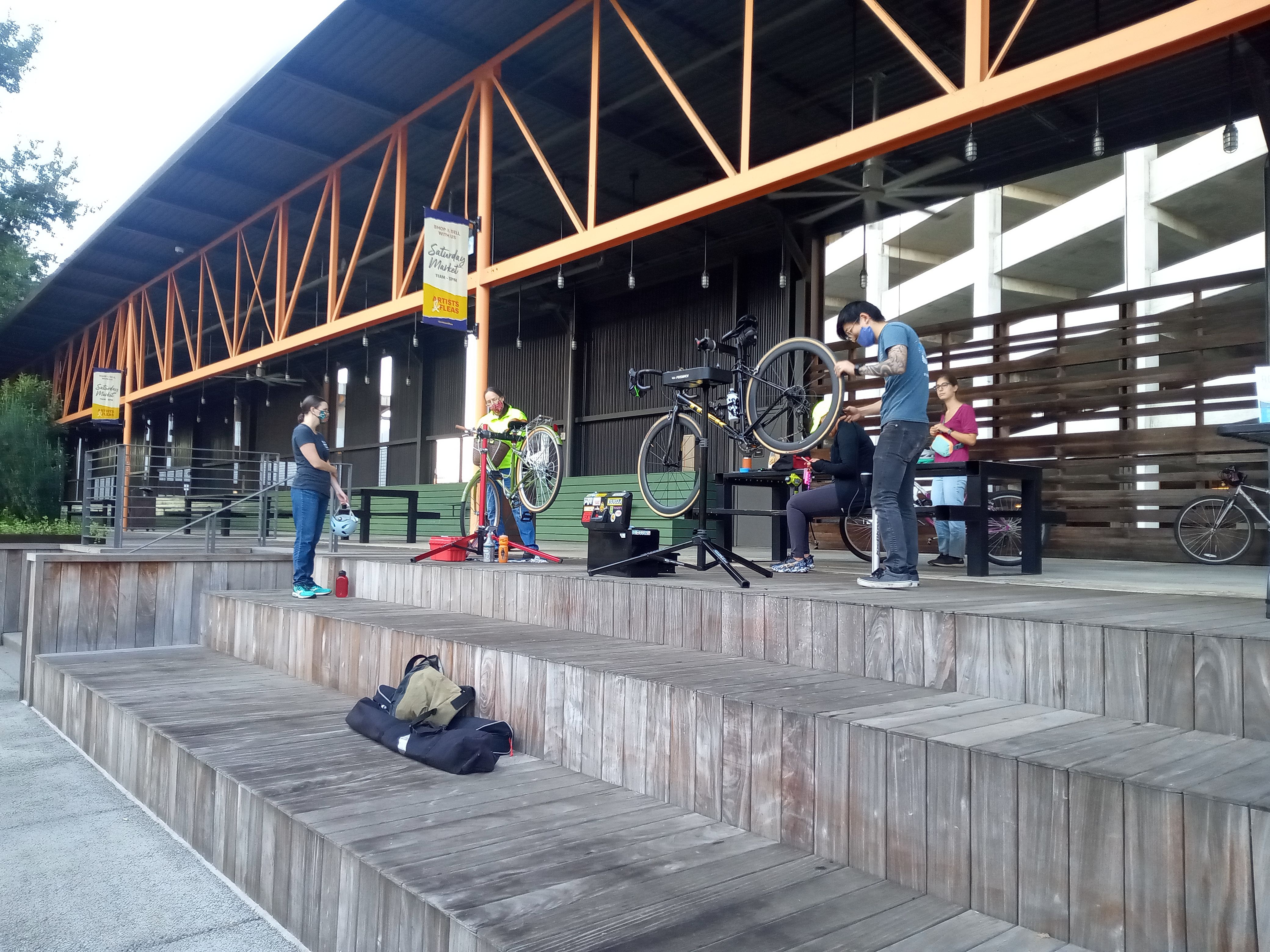 Two mechanics provide free bike tune-ups at Ponce City Market