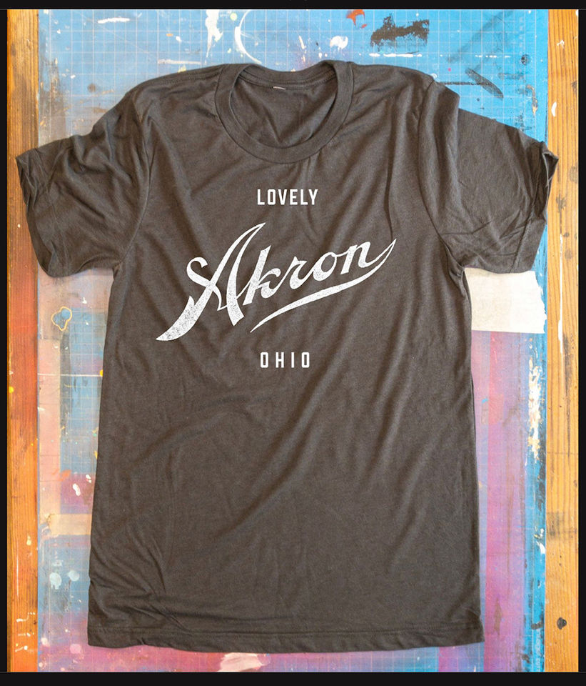Photograph of a Lovely Akron t-shirt, designed by Micah Kraus