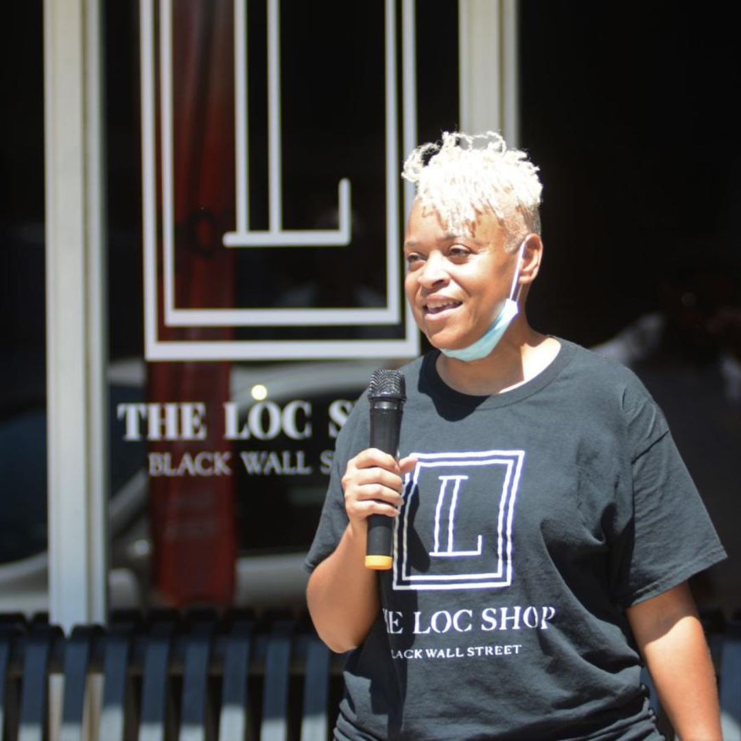 Gina Woods speaking at The Loc Shop